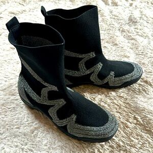 Brand new black booties. Memory foam insole